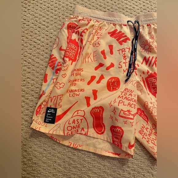 Nike Running Dri-FIT A.I.R. Nathan Bell graphic woven shorts in dusty orange - Picture 6 of 8